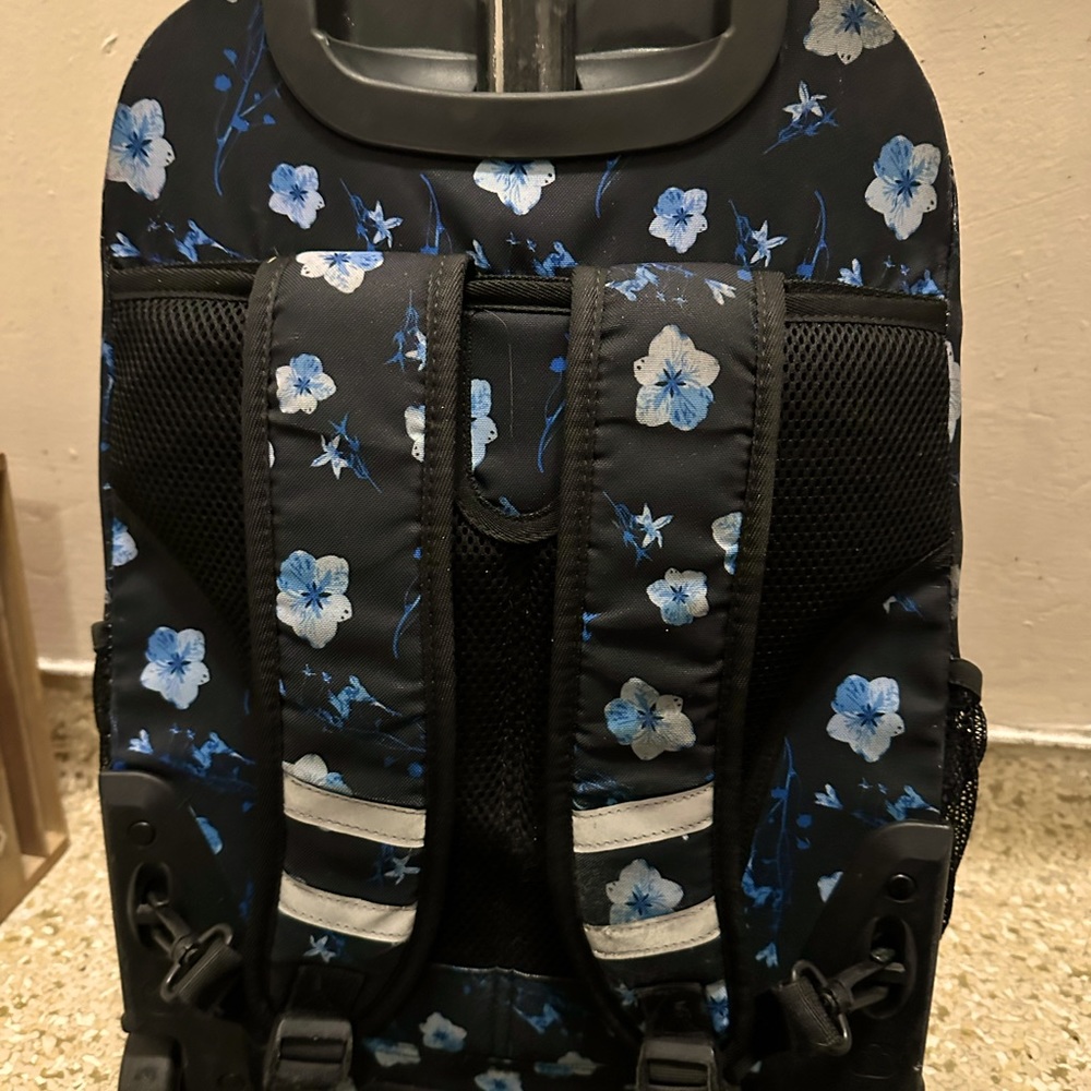 J World Black and blue floral rolling backpack